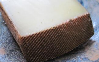 [:fr]Tomme de Champvans au Vin Jura (~500g) (22.90€/Kg)[:es]Tome Vino blanco de "Jura" y Corteza de Especias (~500g) (22.90€/Kg)[:]
